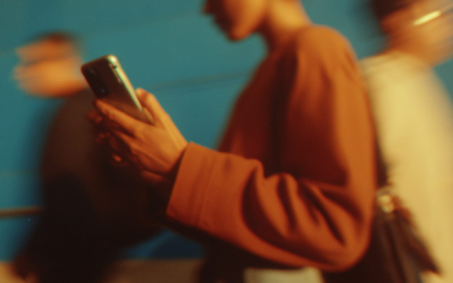 Person using Wispr Flow on Android while walking with a phone in hand